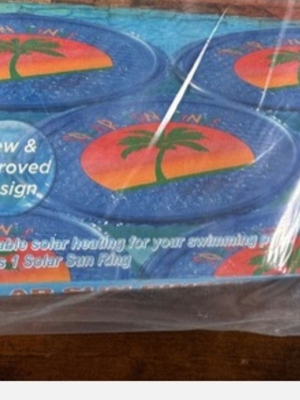 Solar Pool Sun Ring - Blue with Orange Sunset Palm Design
